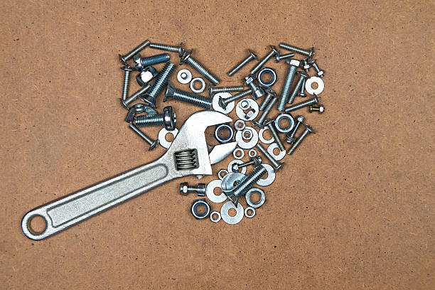 istock Heart with wrench from bolts and nuts 495066778