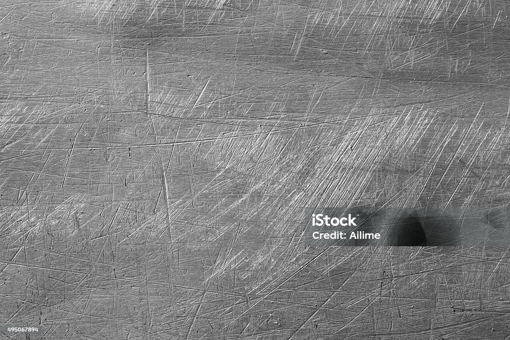 Abstract background Macro shot of scretched metal background, creating an abstract grungy background Metal Stock Photo