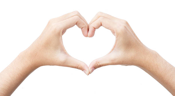 istock Female hands shaping form like a heart symbol on isolate. 495070326