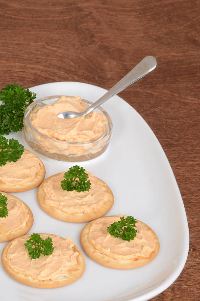 istock crackers salmon pate and parsley on plate 495077492