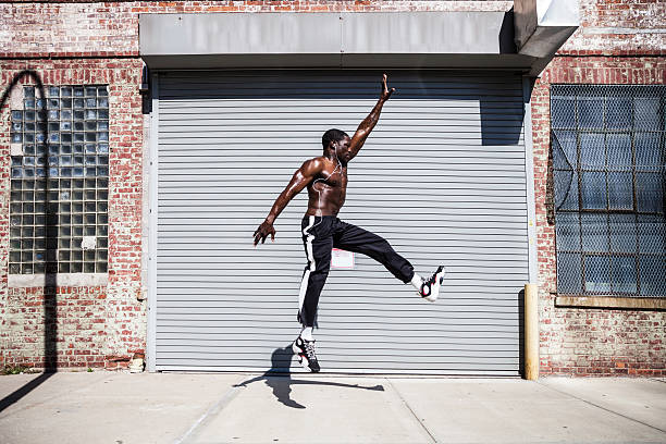 istock Man exercising and jumping in Queens streets - NY 495079828