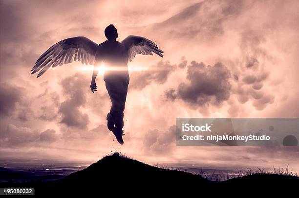 Angel Or Floating Man Rises To New Life Stock Photo - Download Image Now - In Silhouette, Angel, People