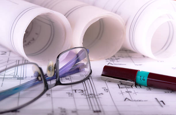 Architecture rolls architectural techical plans project architect blueprints stock photo