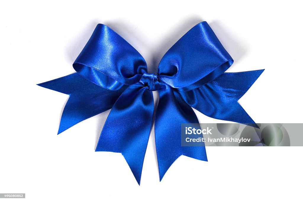 Decorative blue satin bow Decorative blue satin bow isolated on white background Blue Stock Photo
