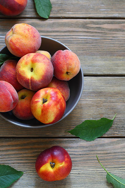 istock fresh and ripe peaches in bowl 495082420