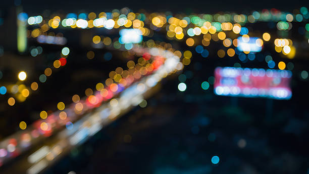 istock Abstract blurred bokeh city highway curved 495094276