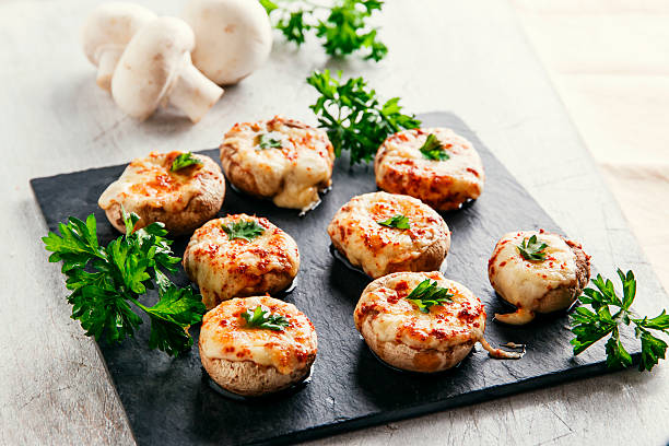 istock baked mushrooms stuffed with cheese 495096810