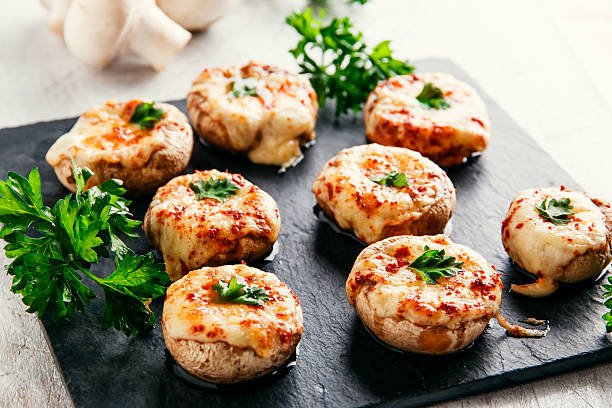 istock baked mushrooms stuffed with cheese 495097068