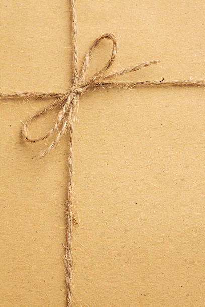 laço de texto em papel pardo - string package brown paper imagens e fotografias de stock