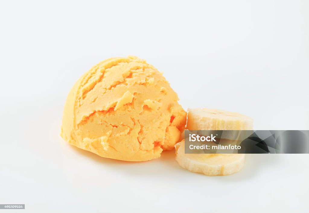 Scoop of orange ice cream 2015 Stock Photo