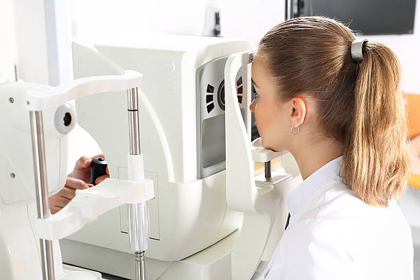 istock Ophthalmologist examines the eyes using a ophthalmic device 495109590