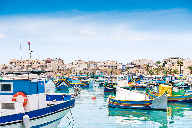 istock boats in Marsaxlokk harbor 495109848