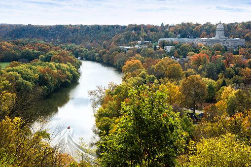 Aerial view of the Kentucky State Capitol in distance beside the Kentucky River on an Autumn day