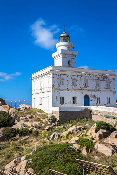 Lighthouse at Capo Testa stock photo