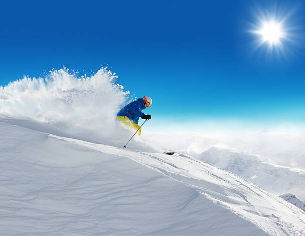 istock Man skier running downhill 495114670