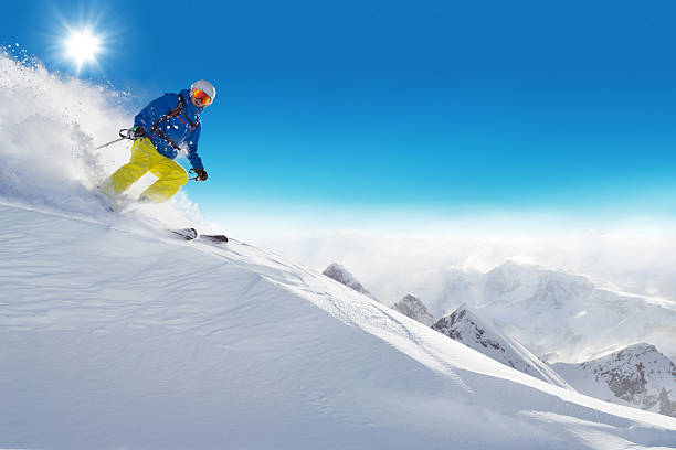 istock Man skier running downhill 495114718