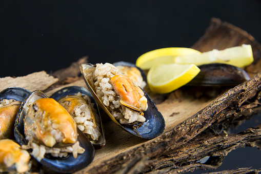 Delicious stuffed mussels with lemon.