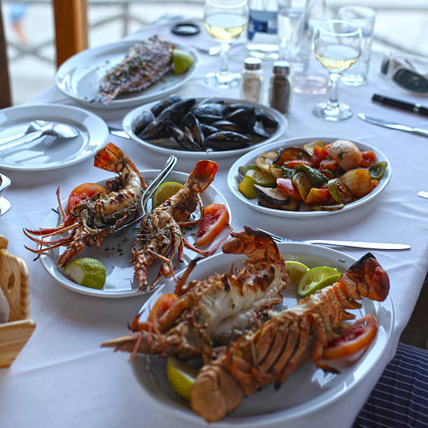 istock Lobster and vegetables in typical greek taverna, Crete 495116470