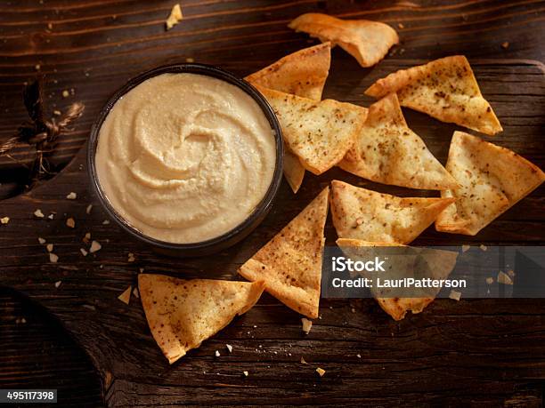 Hummus With Baked Pita Chips Stock Photo - Download Image Now - Hummus - Food, Snack, Dipping Sauce