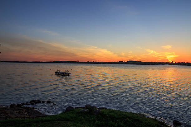 istock Sunset on Chemong with raft 495118454