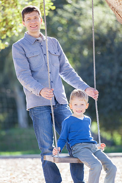 istock family swinging 495140900