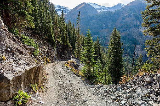 Tough High Mountain Road An autumn day on a scenic but treacherous four-wheel-drive trail -- Black Bear Pass route, located between the top of Red Mountain Pass on U.S. Highway 550 and Telluride, in the San Juan Mountains of Colorado, USA. mountain trails stock pictures, royalty-free photos & images