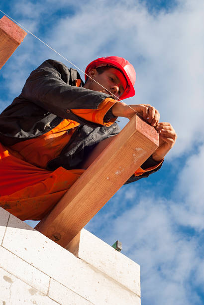 istock installation of roof system 495141764