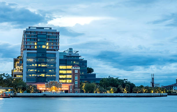 istock Siriraj hospital in night light and cloudy view 495144456