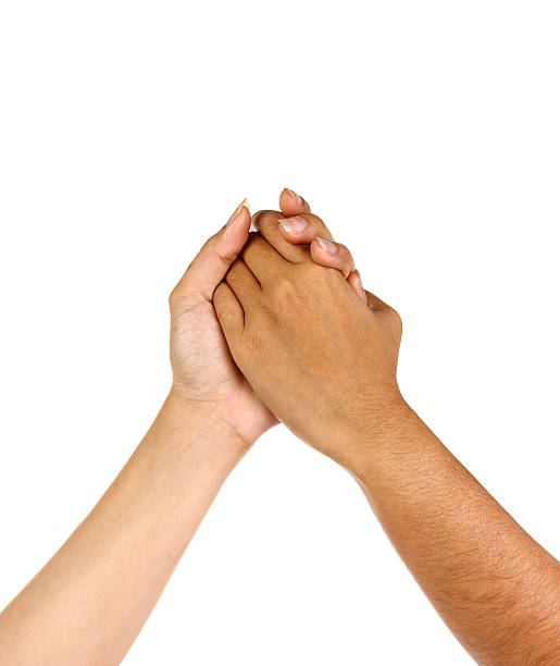 istock Womans hands clasped arm wrestling, isolated on white 495144670