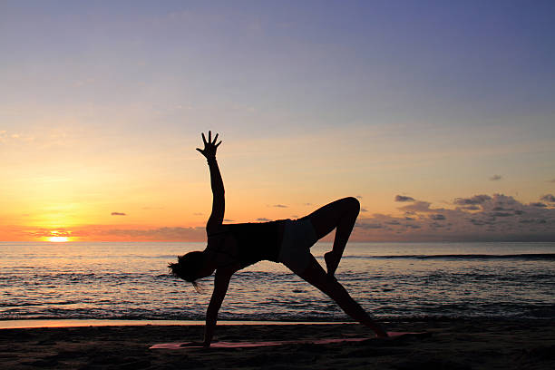 istock Yoga At The Beach On Sunset 495145615