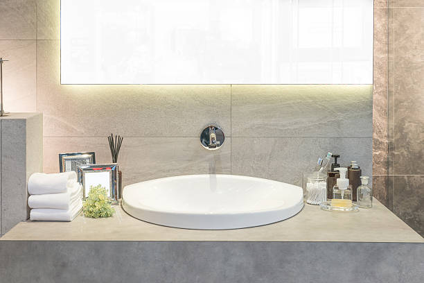 istock Washbasin with towel and decoration in bathroom 495145850