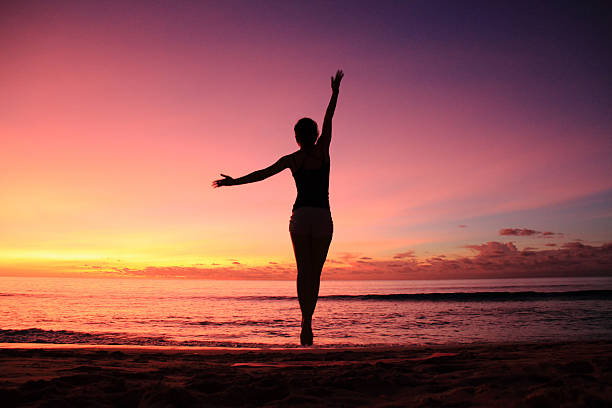 istock Yoga At The Beach On Sunset 495146039