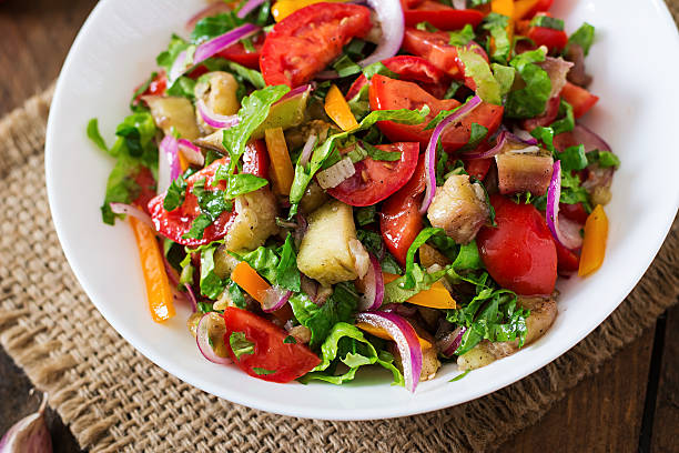 istock Salad baked eggplant and fresh tomatoes 495146166