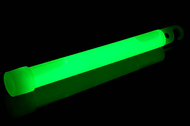 Glow stick A green glow stick glow stick stock pictures, royalty-free photos & images