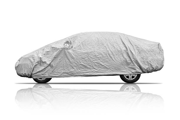 istock car with cover sheet for sunlight. 495148545