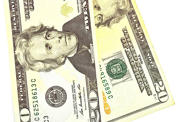 istock macro close up bills of twenty dollars isolated on white 495150599
