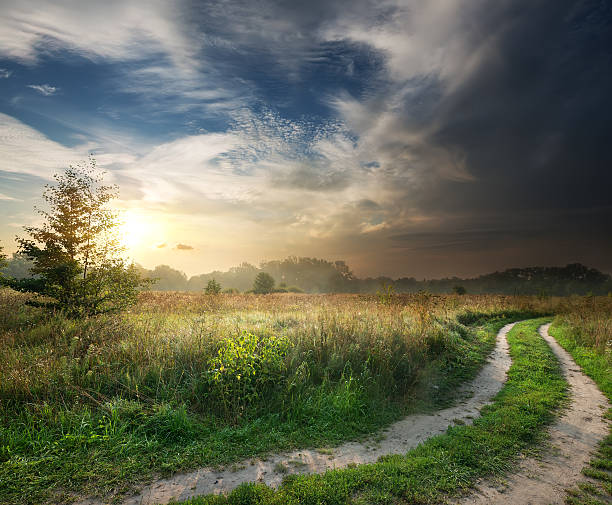 istock Thunderstorm and country road 495150709
