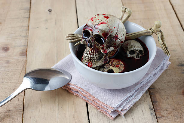 istock Skull and sweet blood in white cup 495170504