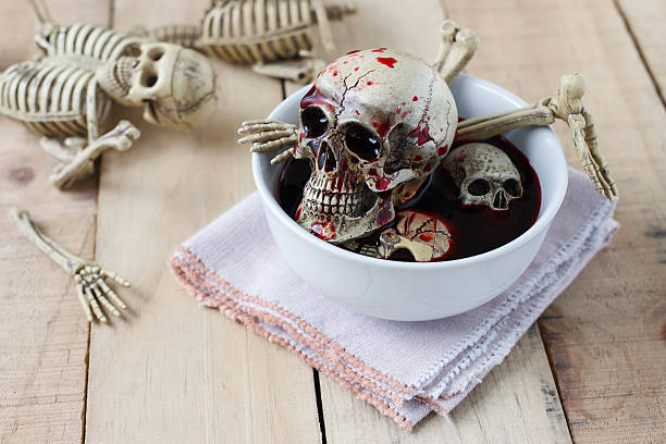 istock Skull and sweet blood in white cup 495170514