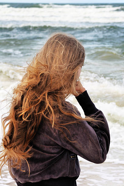 istock Young girl at the sea 495171472