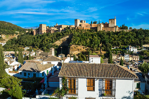 Cityscape of Granada, Spain. Photo shot from vantage point on hill overlooking the town.