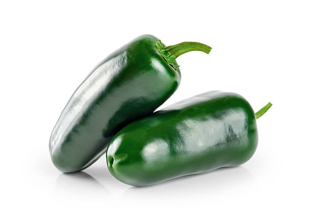istock Green chilies (jalapeno) isolated on white background. 495174552