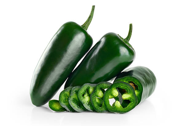 istock Green chilies (jalapeno) isolated on white background. 495174588