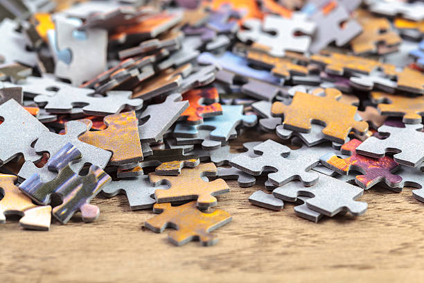 Heap of Jigsaw Puzzle Pieces stock photo
