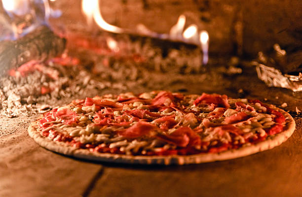 wood oven/brick oven pizza Wood oven italian pizza comida italiana stock pictures, royalty-free photos & images