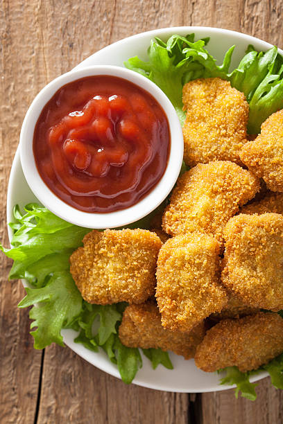 istock chicken nuggets with ketchup 495188144