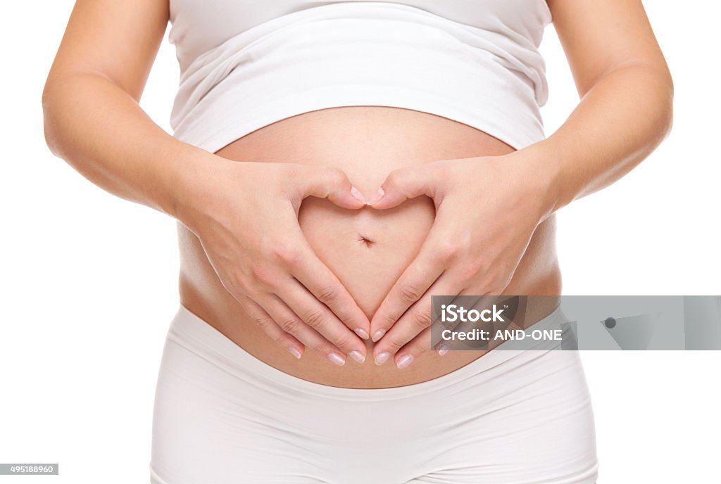 Pregnant woman loving her baby Pregnant woman loving her unborn baby Pregnant Stock Photo