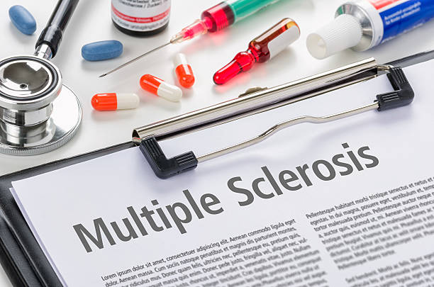 The diagnosis Multiple Sclerosis written on a clipboard stock photo