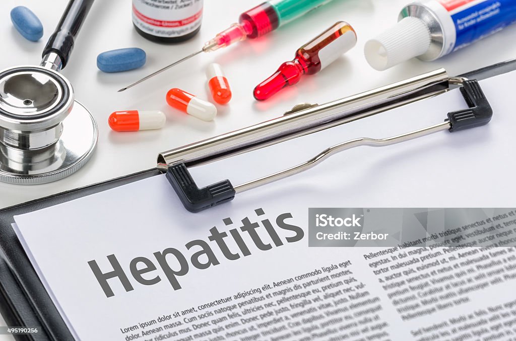 The diagnosis Hepatitis written on a clipboard Hepatitis Stock Photo