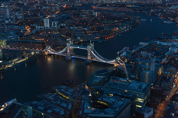 istock Illuminated night view of London's River Thames and London Bridge 495190405